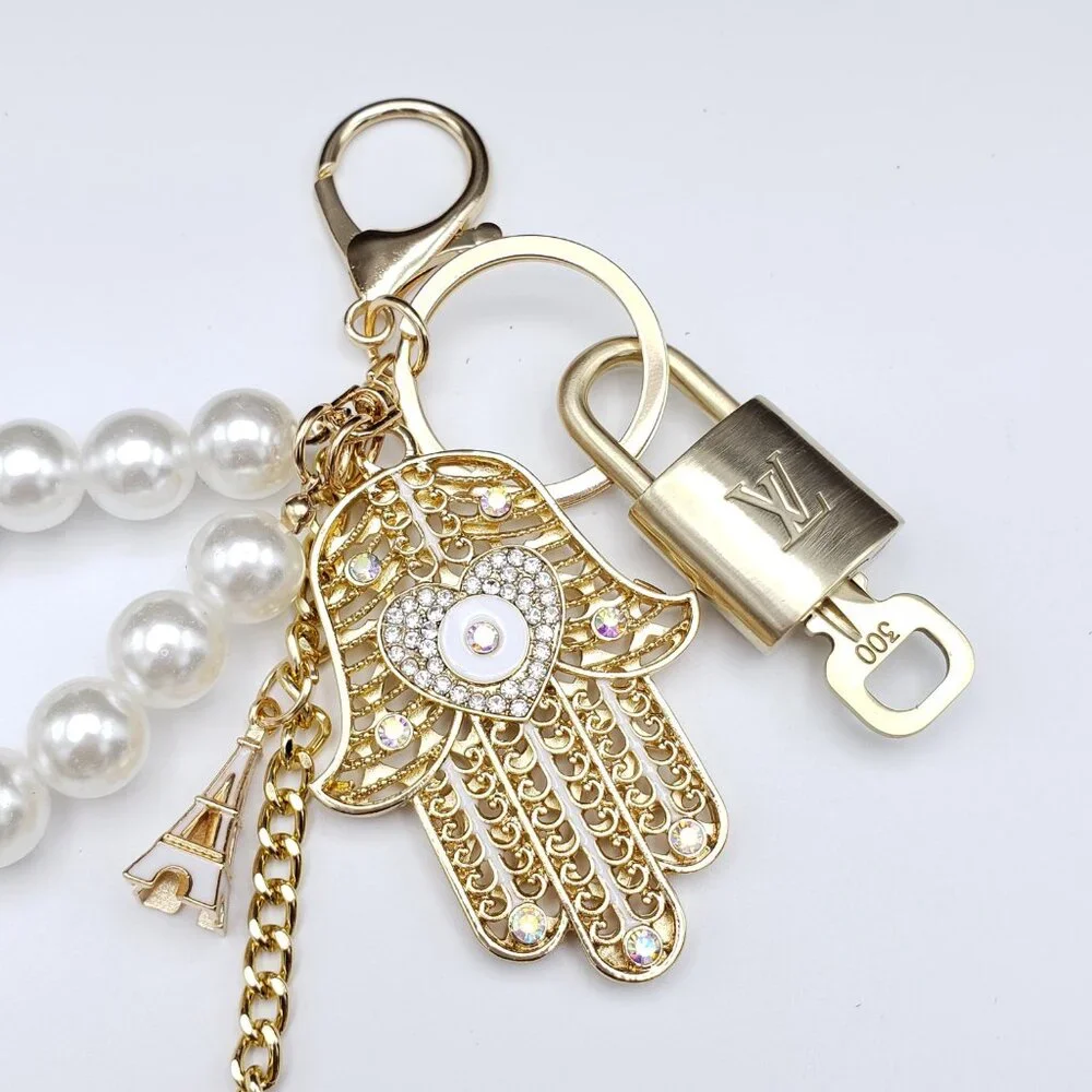 Louis Vuitton Gold Lock 🔒 Authentic LV Key + Unbranded Evil Eye Bag Charm